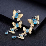 Boucles d'Oreilles Papillon Pendantes Topaze - Vignette | Esprit Papillon