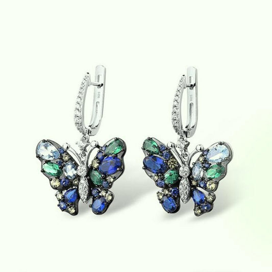 Boucles d'oreilles avec des ailes de papillon indépendantes Boucles d'oreilles avec des ailes de papillon indépendantes