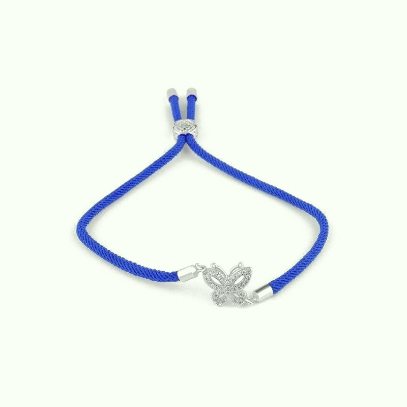  Analyzing image    bracelet-cordon-papillon-bleu-argent