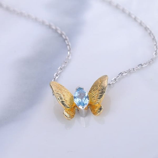 Collier Papillon Cristal Topaze Bleu